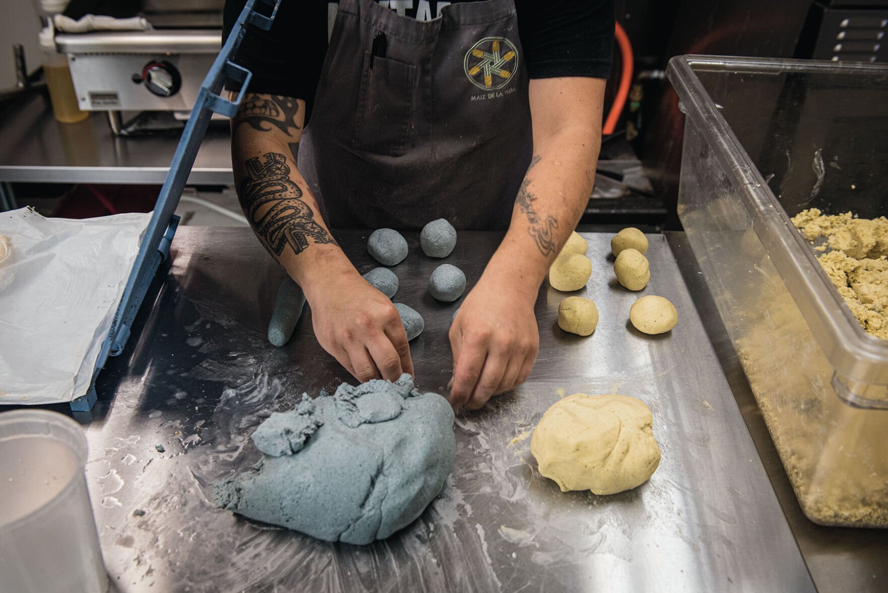 Rolling out tortillas Maiz de la Vida
